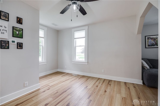 602 W N St, Arcanum, OH 45304 - unfurnished room featuring wood finished floors, baseboards, and a ceiling fan