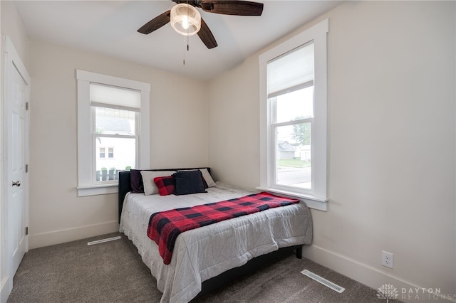 602 W N St, Arcanum, OH 45304 - bedroom with carpet, baseboards, and ceiling fan
