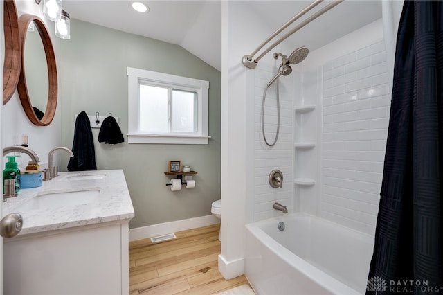 602 W N St, Arcanum, OH 45304 - full bath featuring vanity, toilet, baseboards, wood finished floors, and shower / tub combo