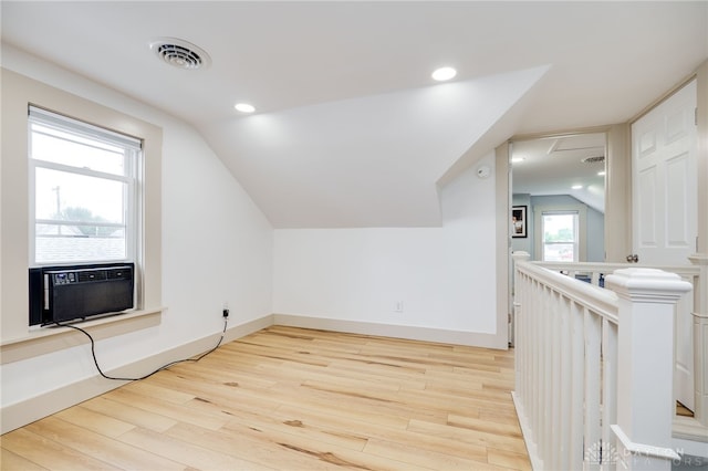 602 W N St, Arcanum, OH 45304 - additional living space featuring light wood-type flooring, cooling unit, lofted ceiling, recessed lighting, and baseboards
