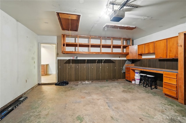2424 Pinegrove Dr, Dayton, OH 45449 - garage with a garage door opener