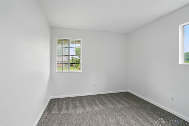 2424 Pinegrove Dr, Dayton, OH 45449 - carpeted empty room featuring baseboards