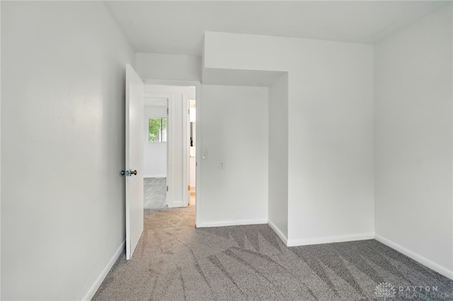 2424 Pinegrove Dr, Dayton, OH 45449 - unfurnished room with carpet flooring and baseboards
