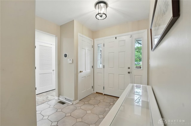 5571 Hugh Dr, Dayton, OH 45459 - foyer entrance featuring baseboards