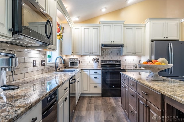 2182 Sharon View Ct, Lebanon, OH 45036 - kitchen featuring black appliances, lofted ceiling, dark wood finished floors, white cabinetry, and light stone countertops