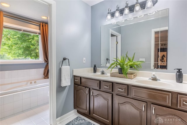 2182 Sharon View Ct, Lebanon, OH 45036 - bathroom featuring double vanity, a relaxing tiled tub, tile patterned floors, and baseboards