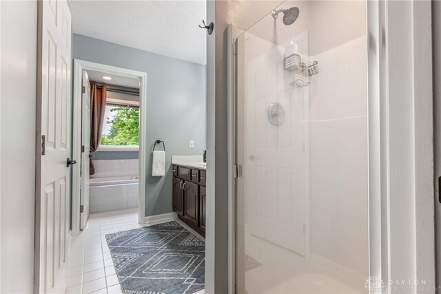 2182 Sharon View Ct, Lebanon, OH 45036 - bathroom featuring a shower stall, vanity, and a bath