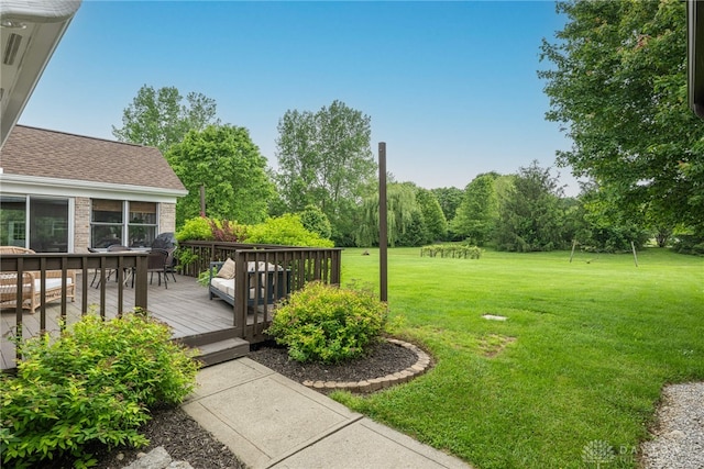 2182 Sharon View Ct, Lebanon, OH 45036 - view of grassy yard with a wooden deck and outdoor dining space