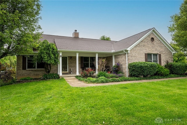 2182 Sharon View Ct, Lebanon, OH 45036 - ranch-style house featuring brick siding, a chimney, and a front yard