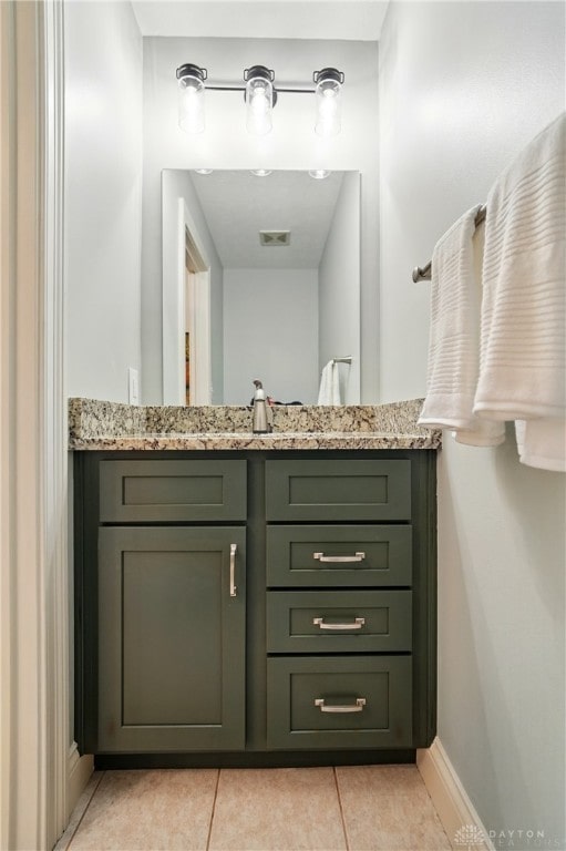 10550 Willow Brook Rd, Dayton, OH 45458 - bathroom featuring vanity, tile patterned flooring, and baseboards