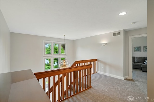 10550 Willow Brook Rd, Dayton, OH 45458 - hall with an upstairs landing, carpet, baseboards, and recessed lighting