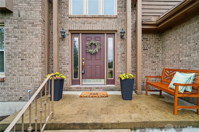 10550 Willow Brook Rd, Dayton, OH 45458 - view of exterior entry featuring brick siding