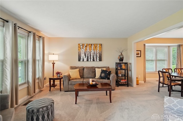 10550 Willow Brook Rd, Dayton, OH 45458 - living room featuring carpet, baseboards, and healthy amount of natural light