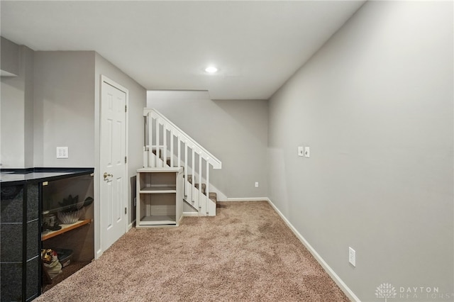 10550 Willow Brook Rd, Dayton, OH 45458 - staircase featuring carpet floors, baseboards, and recessed lighting