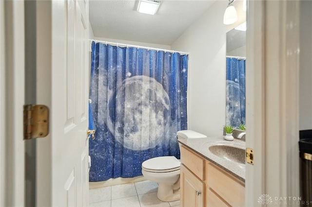 10550 Willow Brook Rd, Dayton, OH 45458 - full bathroom featuring tile patterned flooring, vanity, toilet, and a shower with curtain