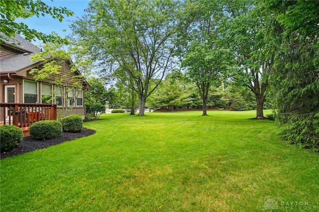 10550 Willow Brook Rd, Dayton, OH 45458 - view of grassy yard with a wooden deck