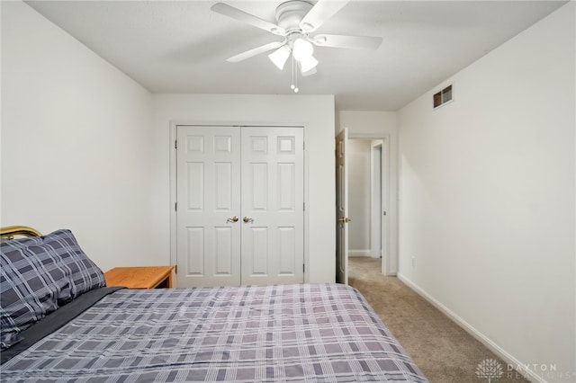 10550 Willow Brook Rd, Dayton, OH 45458 - bedroom with carpet flooring, a closet, baseboards, and ceiling fan
