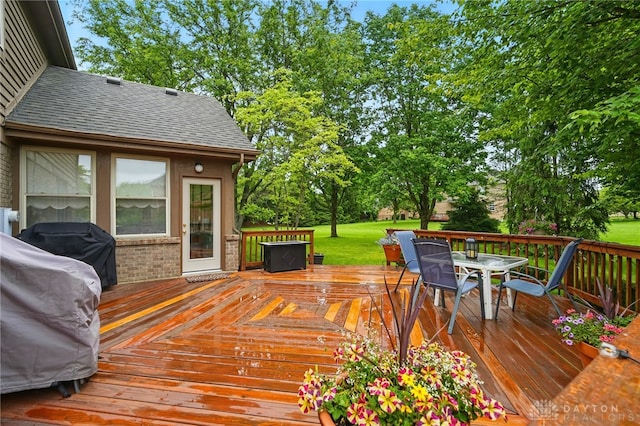 10550 Willow Brook Rd, Dayton, OH 45458 - deck featuring outdoor dining area and a lawn