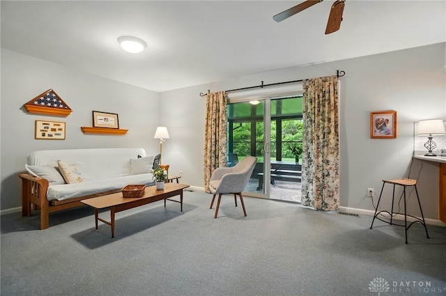 600 Deauville Dr, Washington Twp, OH 45429 - carpeted living room featuring baseboards and a ceiling fan