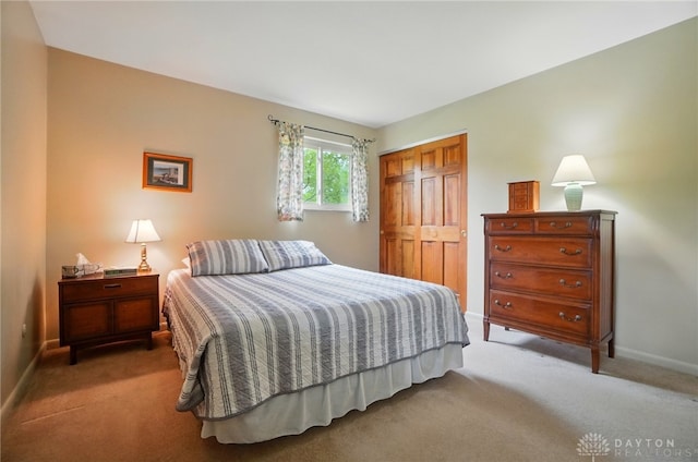 600 Deauville Dr, Washington Twp, OH 45429 - carpeted bedroom with a closet and baseboards