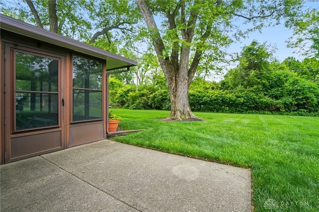 600 Deauville Dr, Washington Twp, OH 45429 - view of grassy yard with a patio
