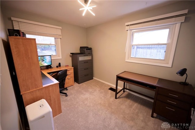 1265 Jeanette Dr, Dayton, OH 45432 - office area with light carpet, plenty of natural light, and baseboards