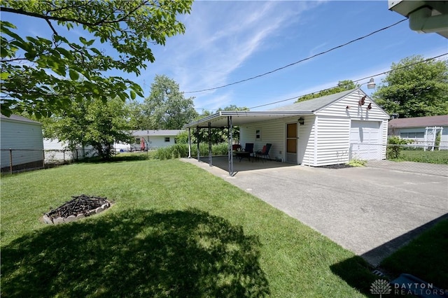 1265 Jeanette Dr, Dayton, OH 45432 - view of yard with a detached garage