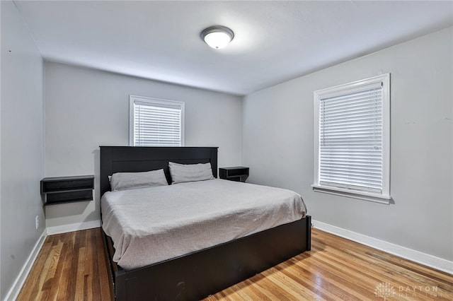 407 Claranna Ave, Oakwood, OH 45419 - bedroom with wood finished floors and baseboards
