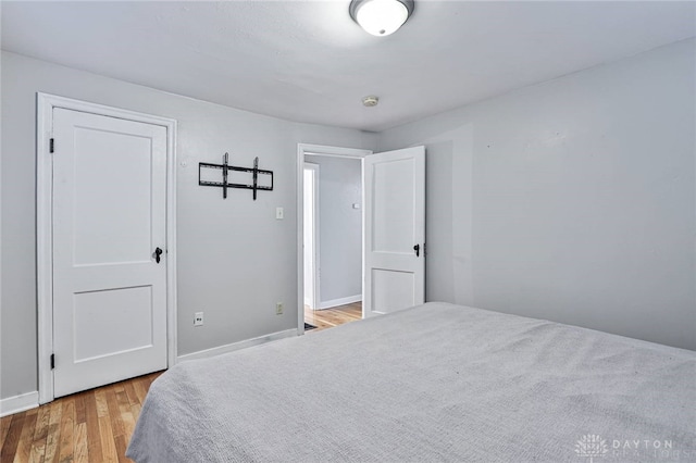 407 Claranna Ave, Oakwood, OH 45419 - bedroom with wood finished floors and baseboards