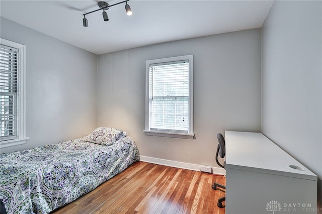 407 Claranna Ave, Oakwood, OH 45419 - bedroom with wood finished floors and a desk