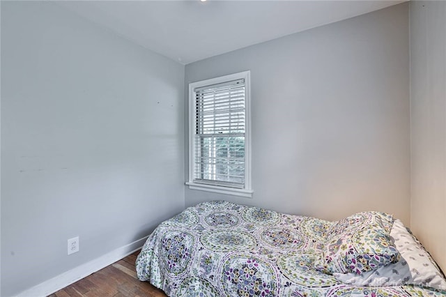 407 Claranna Ave, Oakwood, OH 45419 - bedroom featuring baseboards and dark wood-style floors