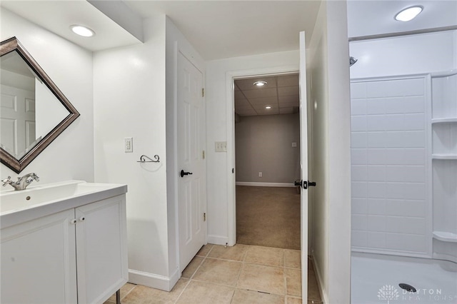 407 Claranna Ave, Oakwood, OH 45419 - bathroom with vanity, a shower, tile patterned floors, and recessed lighting