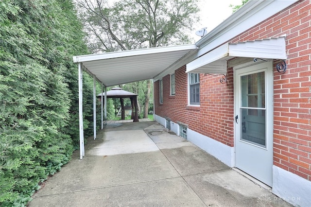 407 Claranna Ave, Oakwood, OH 45419 - view of vehicle parking with an attached carport, a gazebo, and driveway