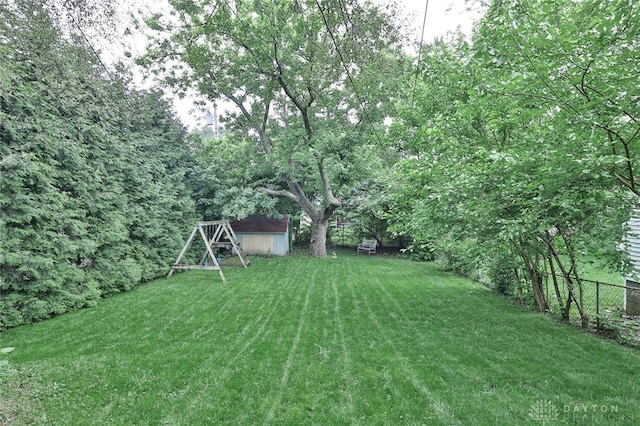 407 Claranna Ave, Oakwood, OH 45419 - view of yard featuring a storage unit