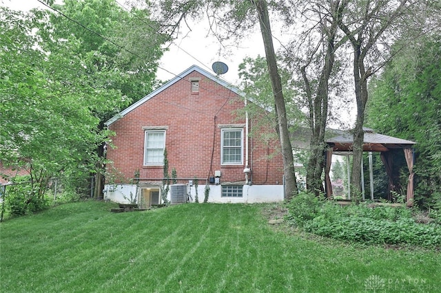 407 Claranna Ave, Oakwood, OH 45419 - rear view of property with a gazebo, a yard, and brick siding