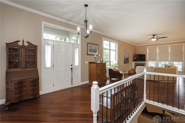 7516 Blue Fox Run, West Chester, OH 45069 - foyer featuring wood finished floors, ornamental molding, a chandelier, and ceiling fan