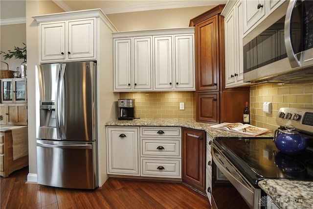 7516 Blue Fox Run, West Chester, OH 45069 - kitchen featuring appliances with stainless steel finishes, ornamental molding, dark wood-style floors, backsplash, and light stone counters