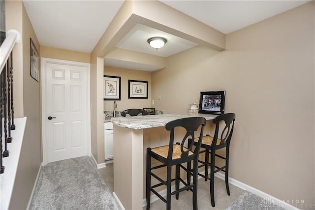 7516 Blue Fox Run, West Chester, OH 45069 - indoor wet bar featuring baseboards
