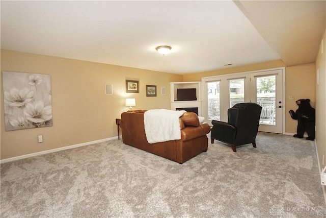 7516 Blue Fox Run, West Chester, OH 45069 - living room with carpet floors and a fireplace
