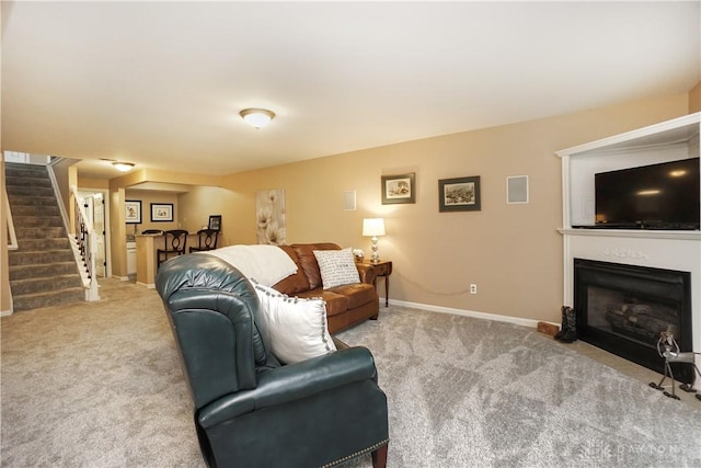 7516 Blue Fox Run, West Chester, OH 45069 - carpeted living area with stairway and a fireplace