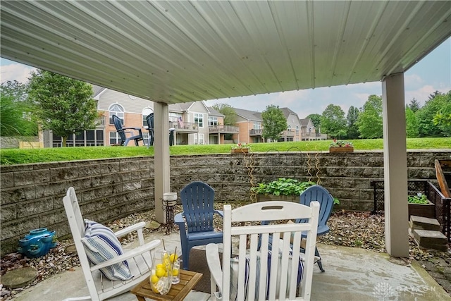 7516 Blue Fox Run, West Chester, OH 45069 - view of patio featuring outdoor dining area and a residential view