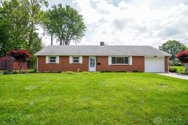 4908 Walden Ln, Dayton, OH 45429 - single story home featuring a garage, brick siding, a front lawn, and concrete driveway