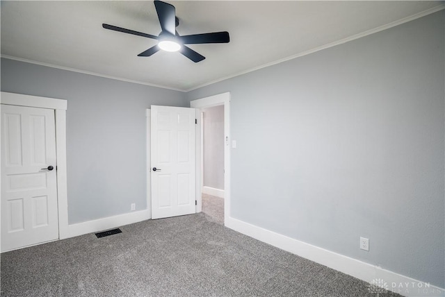 522 Pennsylvania Ave, Troy, OH 45373 - unfurnished bedroom with carpet floors, crown molding, baseboards, and a ceiling fan