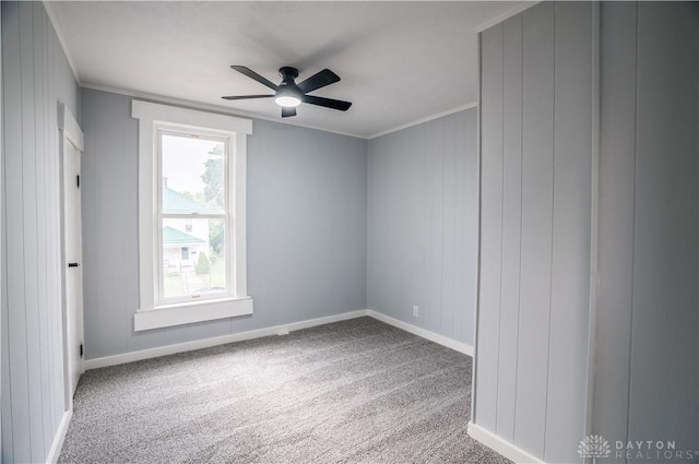 522 Pennsylvania Ave, Troy, OH 45373 - carpeted empty room featuring a ceiling fan, baseboards, and crown molding