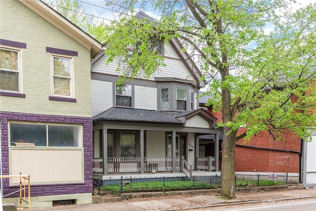 1628 E 5th St, Dayton, OH 45403 - victorian-style house with a porch