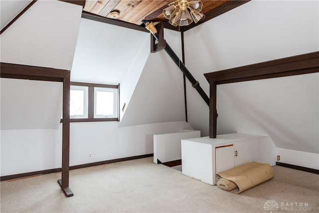 1628 E 5th St, Dayton, OH 45403 - bonus room with vaulted ceiling, carpet floors, baseboards, and wood ceiling