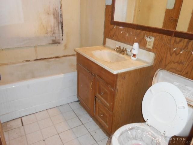 1202 Burt St, Springfield, OH 45505 - bathroom with toilet, vanity, and tile patterned floors