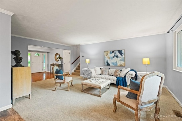286 Honey Jane Dr, Beavercreek, OH 45434 - living area featuring crown molding, stairs, wood finished floors, and baseboards