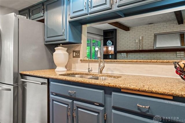 286 Honey Jane Dr, Beavercreek, OH 45434 - kitchen with a sink, blue cabinets, tasteful backsplash, appliances with stainless steel finishes, and beam ceiling