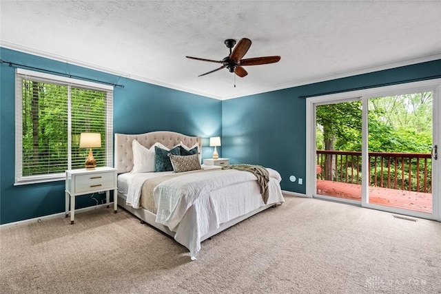 286 Honey Jane Dr, Beavercreek, OH 45434 - carpeted bedroom featuring access to outside, multiple windows, baseboards, ornamental molding, and a ceiling fan